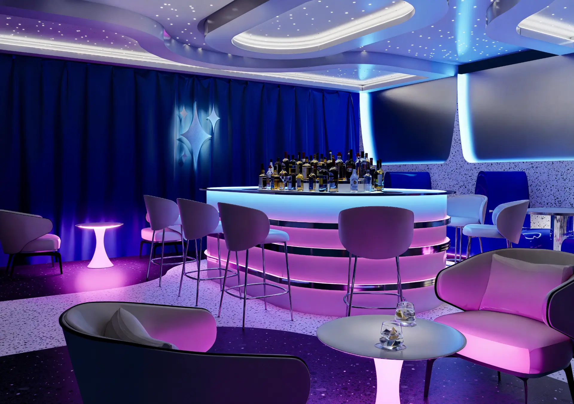 Wide view of the Googs atomic bar with curved neon-lit ceiling, pink and blue glow, terrazzo floors, and lounge seating in Los Angeles