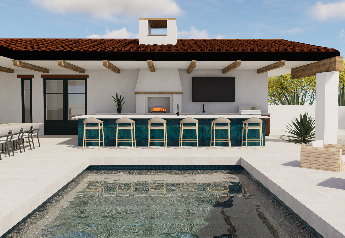 Poolside outdoor kitchen with turquoise tile bar, wood beams, fireplace, and lake view in Lake Havasu City